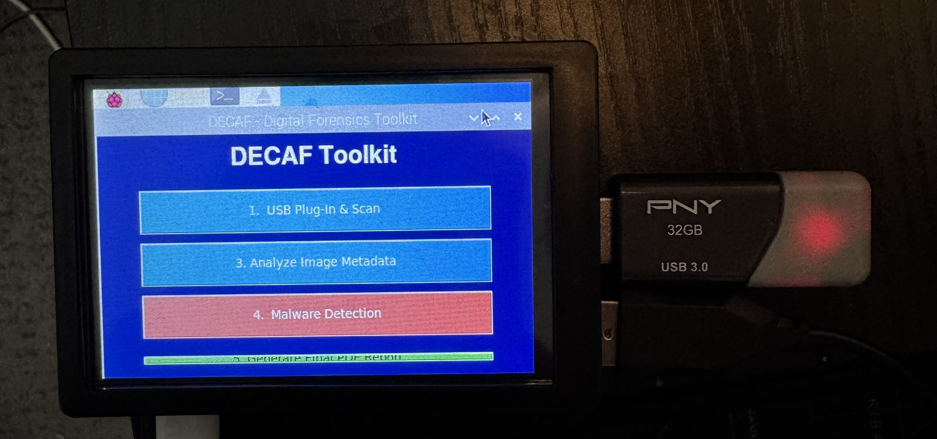 DECAF device plugged in next to a USB drive